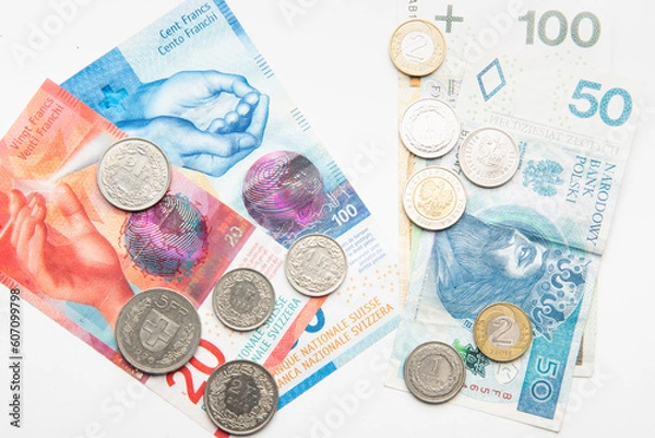 Obraz polish zloty currency and swiss francs currency coins and banknotes