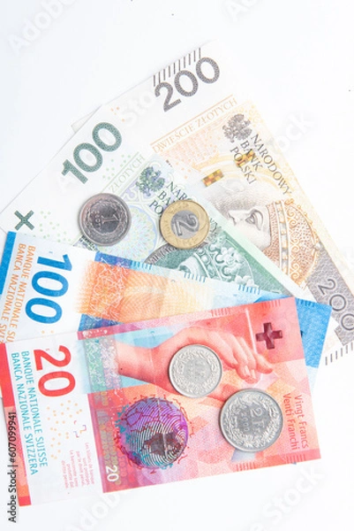 Obraz polish zloty currency and swiss francs currency coins and banknotes