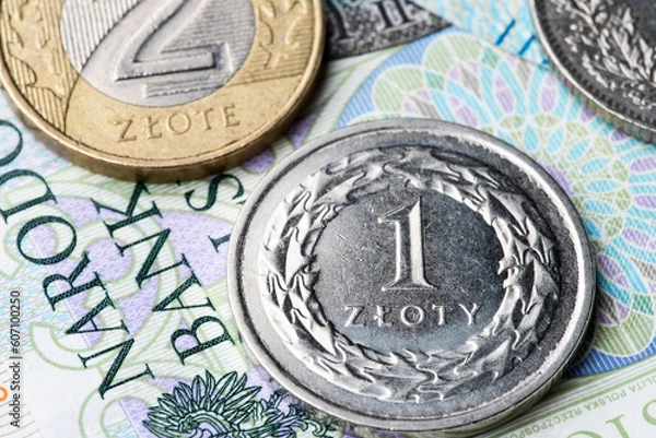 Obraz polish zloty currency coins on banknote close-up