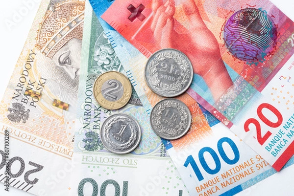 Obraz polish zloty currency and swiss francs currency coins and banknotes