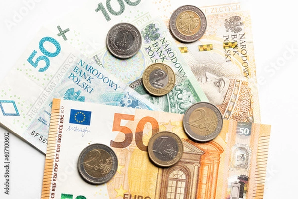 Obraz polisch currency zloty and euro currency coins and banknotes
