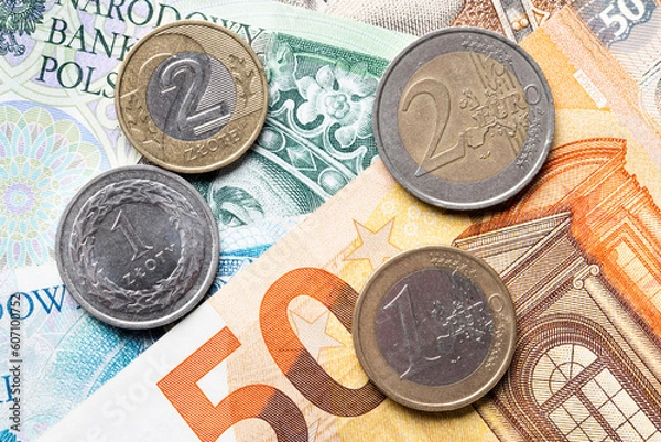 Obraz polisch currency zloty and euro currency coins and banknotes