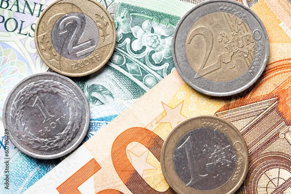 Obraz polisch currency zloty and euro currency coins and banknotes