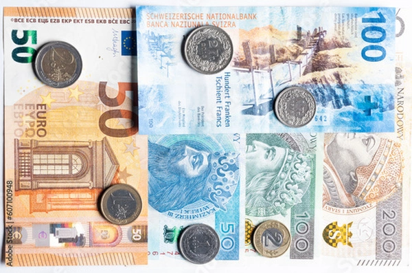 Obraz polish zloty, swiss francs and euro currency coins and banknotes