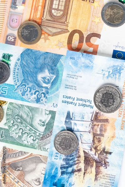 Obraz polish zloty, swiss francs and euro currency coins and banknotes