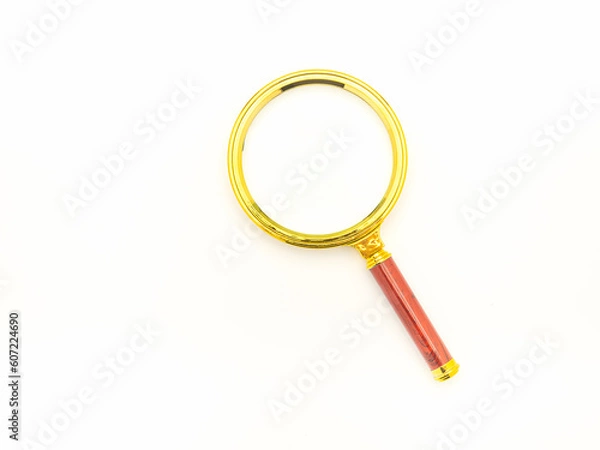 Fototapeta Magnifying glass isolated on a white background
