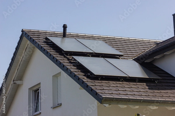 Fototapeta solar panel rooftop on building roof with construction scaffold