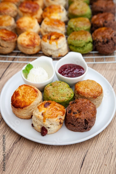 Fototapeta Five flavour of scone, chocolate, butter, cranberry, Earl grey, Matcha, served with clotted cream and raspberry jam. 