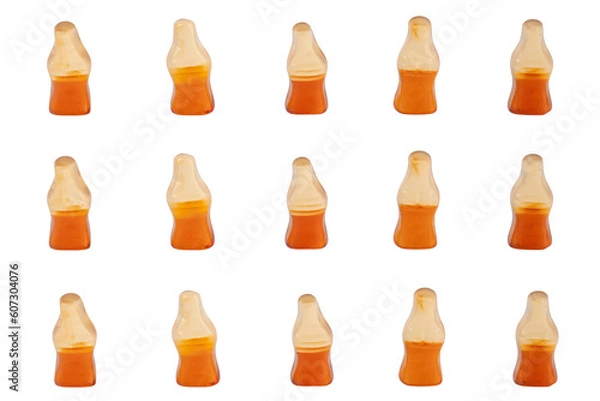 Fototapeta Cola flavored gummy jellies in the shape of cola bottles,isolated over transparent background.