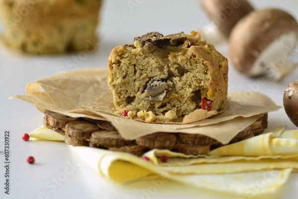 Obraz Muffin with mushrooms and cheese on cornmeal, snack muffin