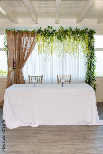 Fototapeta  wedding table setup with florals on the background