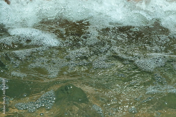 Fototapeta Running water bubbles.