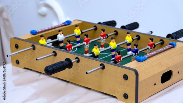Fototapeta Board game football close up. Two soccer teams. The concept of entertainment in free time.