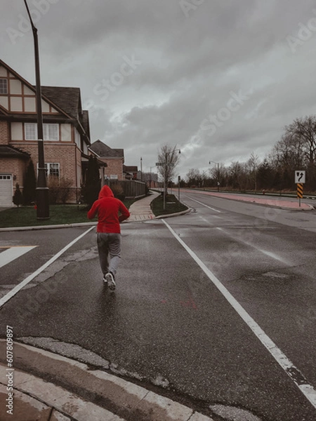 Fototapeta Girl Runningon the street