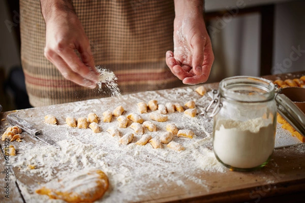 Obraz Cook preparing raw pumpking gnocchi