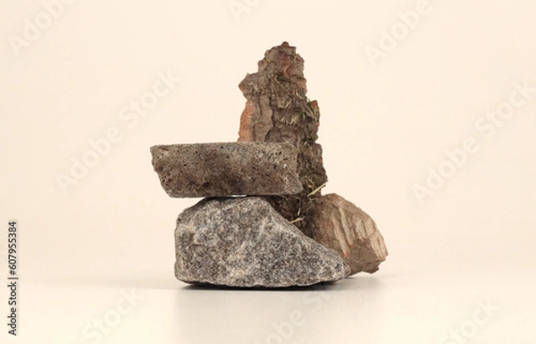 Obraz Stack of stones platform podium on beige light background. Minimal empty display product presentation scene.