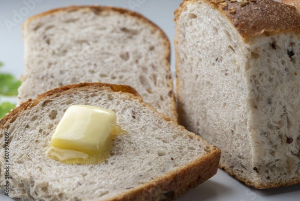 Fototapeta パンの上で溶けるバター