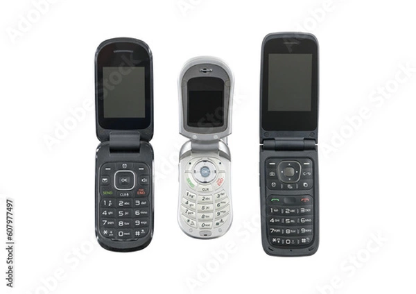 Fototapeta Three old flip cell phones isolated with cut out background.  