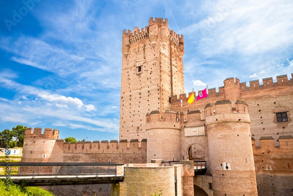 Fototapeta View of the western wall of the entrance of Castillo de la Mota on a sunny day, Medina del Campo, Valladolid, Spain