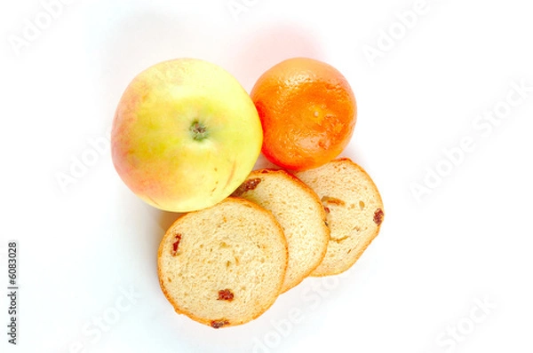 Fototapeta set of the apple, mandarin and few crackers