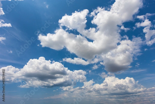 Fototapeta Blue sky with clouds background overlay. Ideal for sky replacement