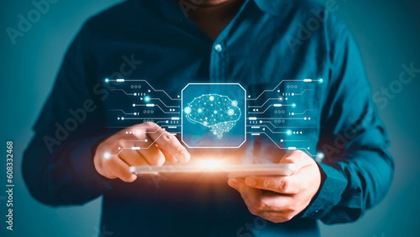 Obraz Hand using tablet and human brain head up display network technology for global communication background. Digital data and internet computer social concept. Big data Artificial intelligence theme