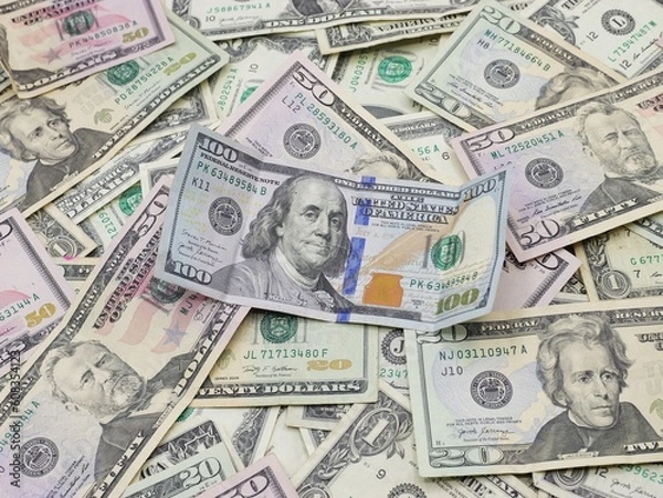 Fototapeta Several $100, $50, $20, $1 and $2 Bills Close Up