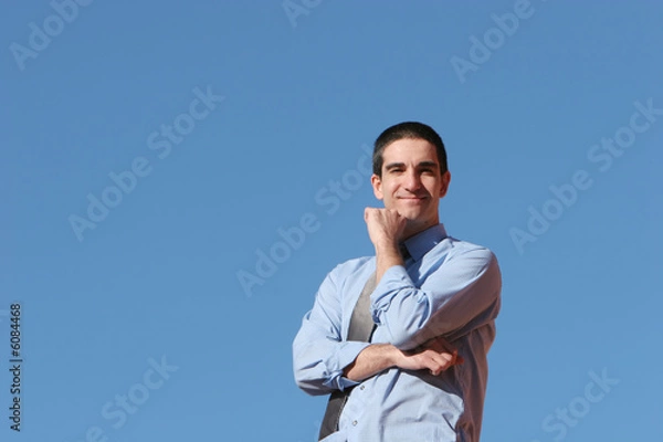 Fototapeta Young successful businessman outdoors