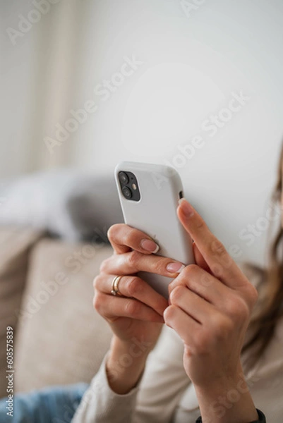 Fototapeta person using smartphone