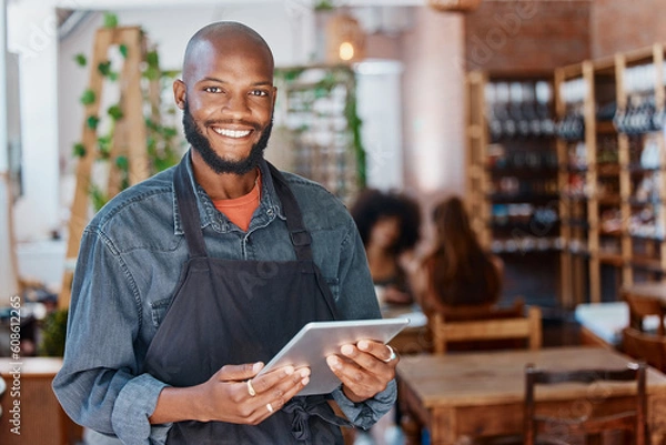 Obraz Restaurant, tablet and portrait of man or small business owner, e commerce and cafe or coffee shop management. Happy waiter or african person with sales on digital technology or internet for startup