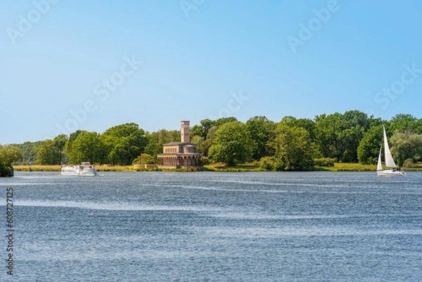 Fototapeta The Protestant Church of the Redeemer, situated at the lake Jungfernsee, build 1844 in Romanesque Revival architecture, is part of the World Heritage Site of Palaces and Parks of Potsdam and Berlin