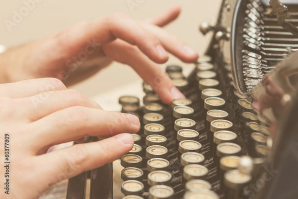 Obraz Hands writing on old typewriter
