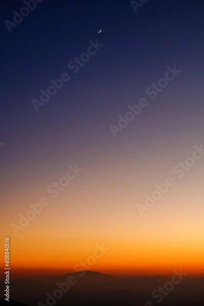 Obraz clear twilight sunset sky with crescent Moon and Venus 