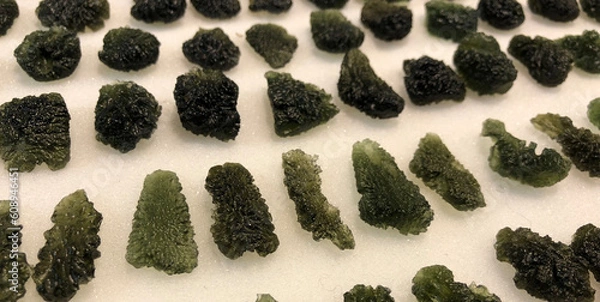 Fototapeta Close up view of amazing moldavite stones 