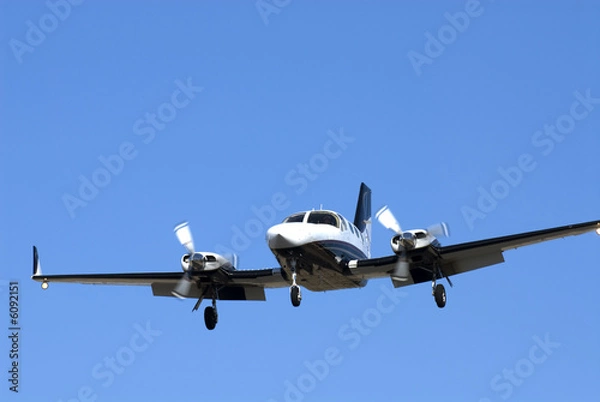 Obraz private twin engine plane landing approach