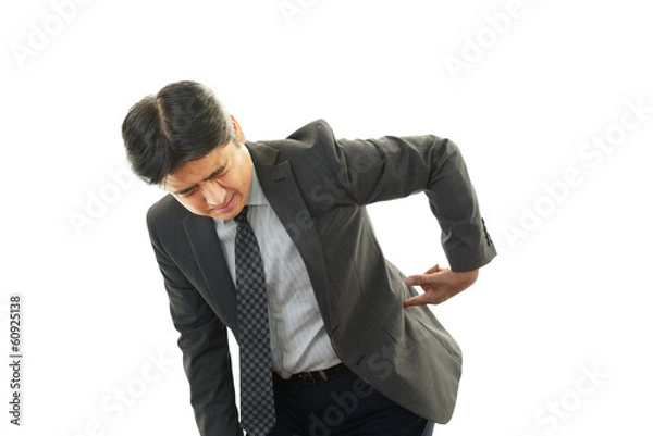 Fototapeta 腰痛を訴えるビジネスマン