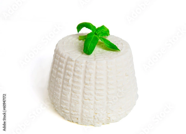 Fototapeta Ricotta with basil on white background