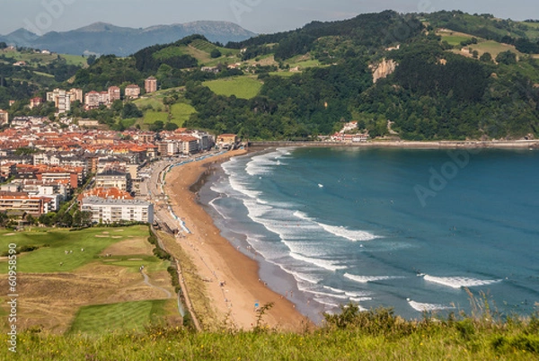 Fototapeta Panoramic view of Zarautz with Guetaria on the background on a b
