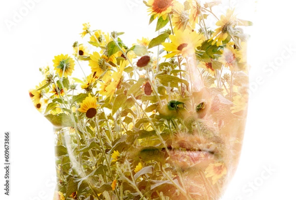 Fototapeta A double exposure technique portrait of a man and yellow flowers