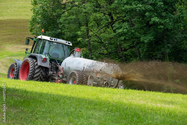 Obraz Spreading liquid manure . Gülle ausbringen