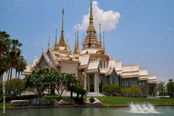 Fototapeta Luang Pho To Temple, a large body, a large building, a place of merit making for Buddhists At Sikhiu District, Thailand 16-05-2023