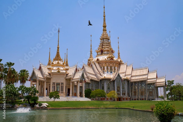 Fototapeta Luang Pho To Temple, a large body, a large building, a place of merit making for Buddhists At Sikhiu District, Thailand 16-05-2023