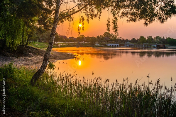 Obraz Wschód słońca nad jeziorem