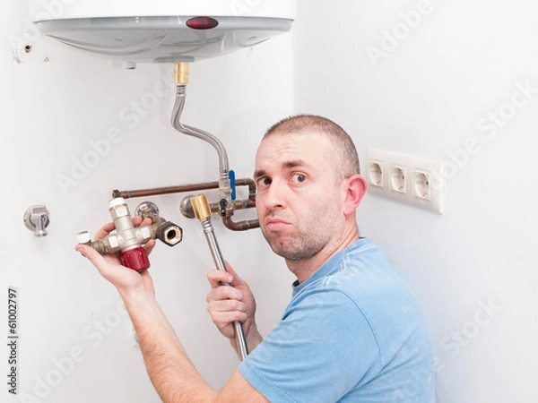 Fototapeta Inexperienced plumber