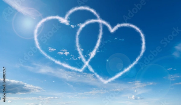 Obraz heart shaped clouds on blue sky background
