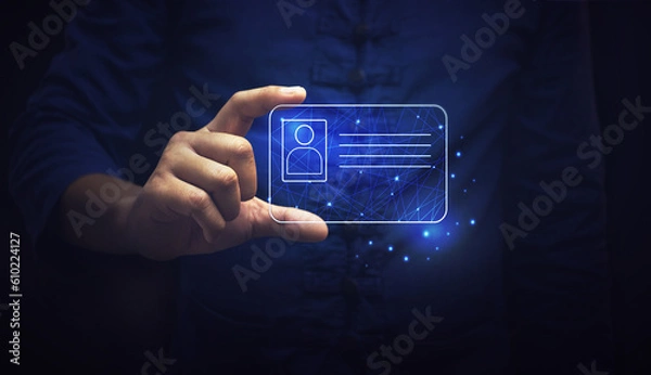 Fototapeta human hand holding digital identification card, technology and innovation concept.