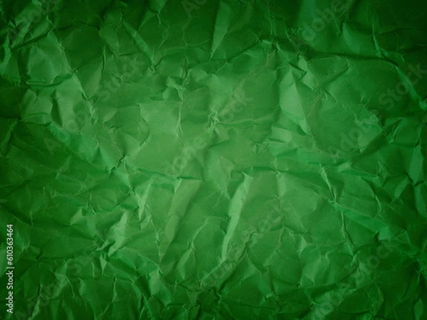Fototapeta A crumpled green paper background