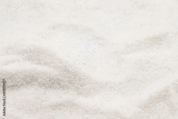 Fototapeta Natural minaret crystalline non-iodized grinding salt isolated on white background. Pile of Ground rock salt