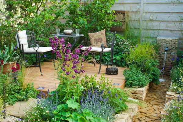 Fototapeta Relaxation area in a garden