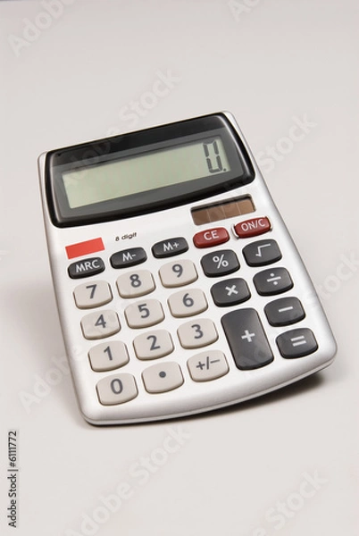 Fototapeta an office calculator on a white background